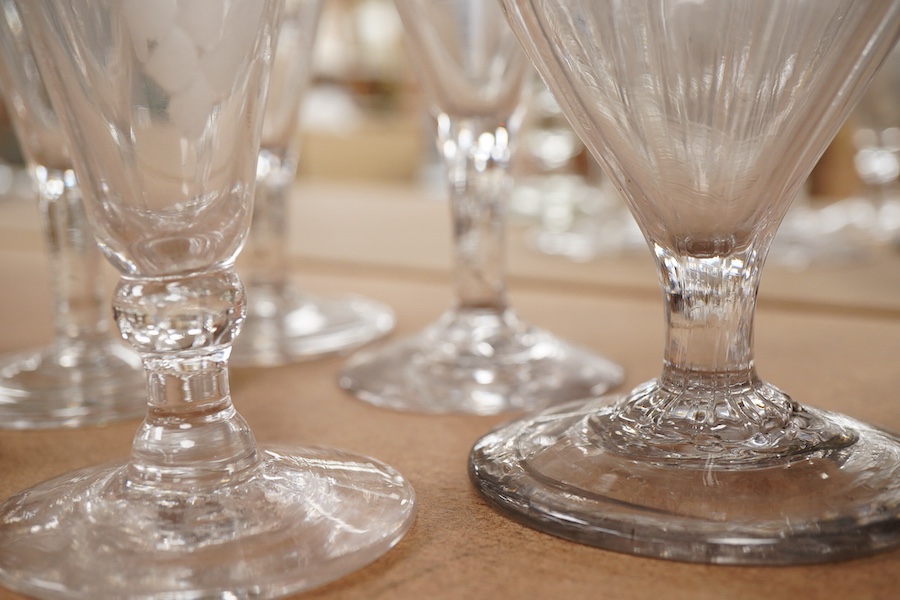 A a set of three early 19th century ale glasses with folded feet, together with two additional engraved ale glasses, a knopped rummer and another, tallest 18cm